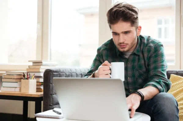 depositphotos_135031270-stock-photo-man-looking-at-laptop-on.jpg